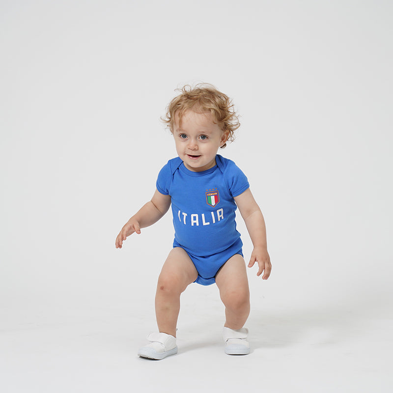 This model baby is wearing a bodysuit for display, front view.
