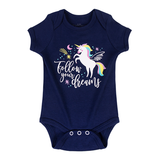 One-piece bodysuit with unicorn pattern and the text 'Follow Your Dreams' on the front.